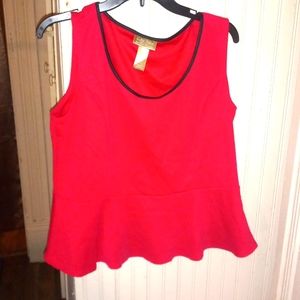 Pinksh red with black stripein the neck area